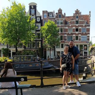 Guests with Dennis at a market in Amsterdam