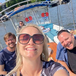 Guests cycling with Dennis through Amsterdam